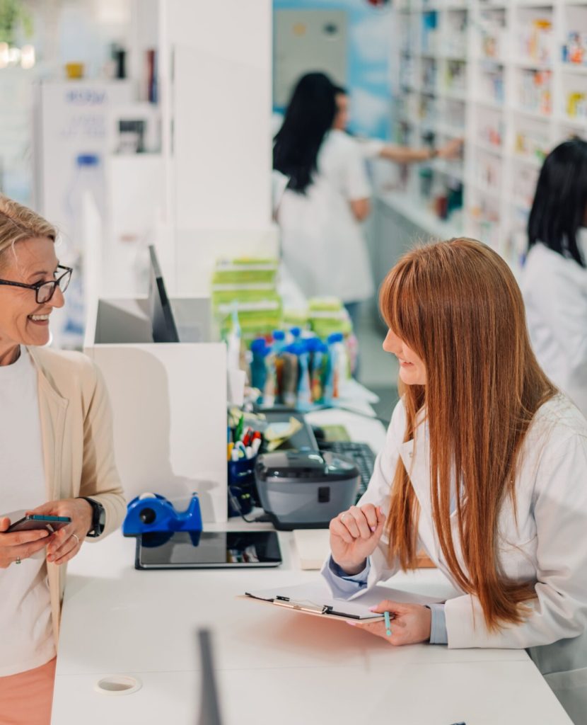 female-pharmacist-helping-senior-woman-choosing-pr-2025-04-03-20-24-39-utc